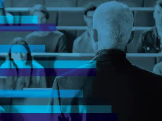 professor standing before a classroom