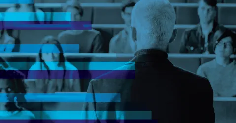 professor standing before a classroom