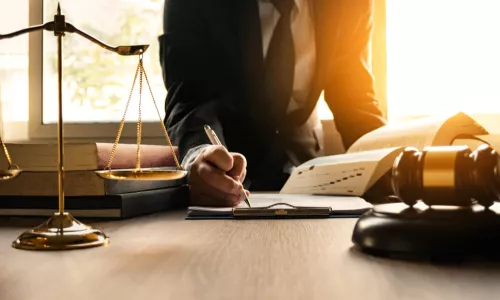 Lawyer working contract papers wooden gavel court justice law attorney 