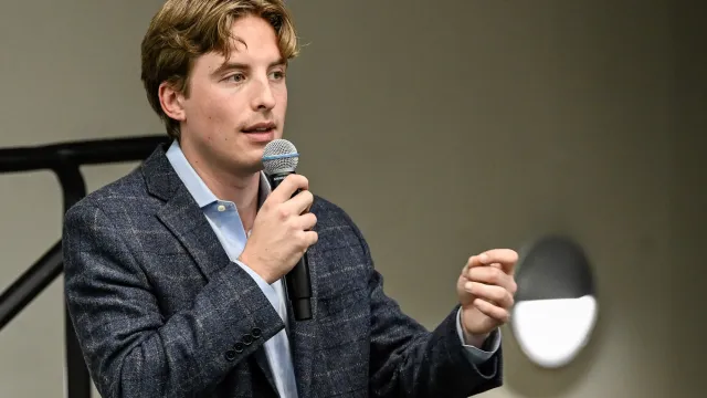 FIRE staffer Will Harris speaks at a Let's Talk event in Utah in 2025