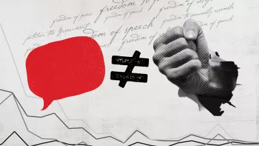 A fist punching through a sheet of paper