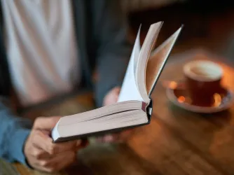 Student reading book